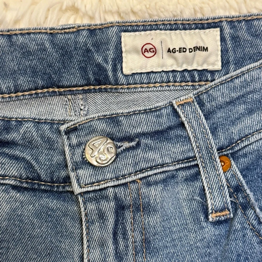AG Adriano Goldschmied Light Wash Bootcut Jeans w/ Raw Hem